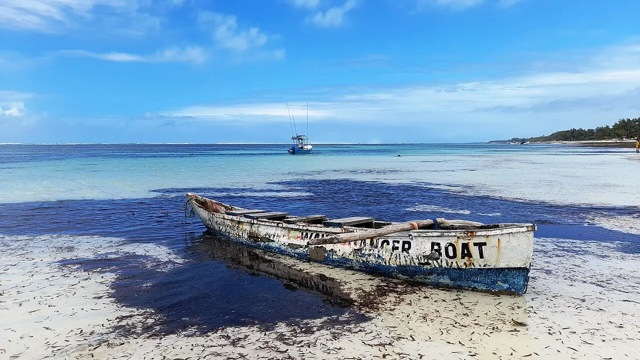 A boat beside the shore at Diani Beach, Kenya.